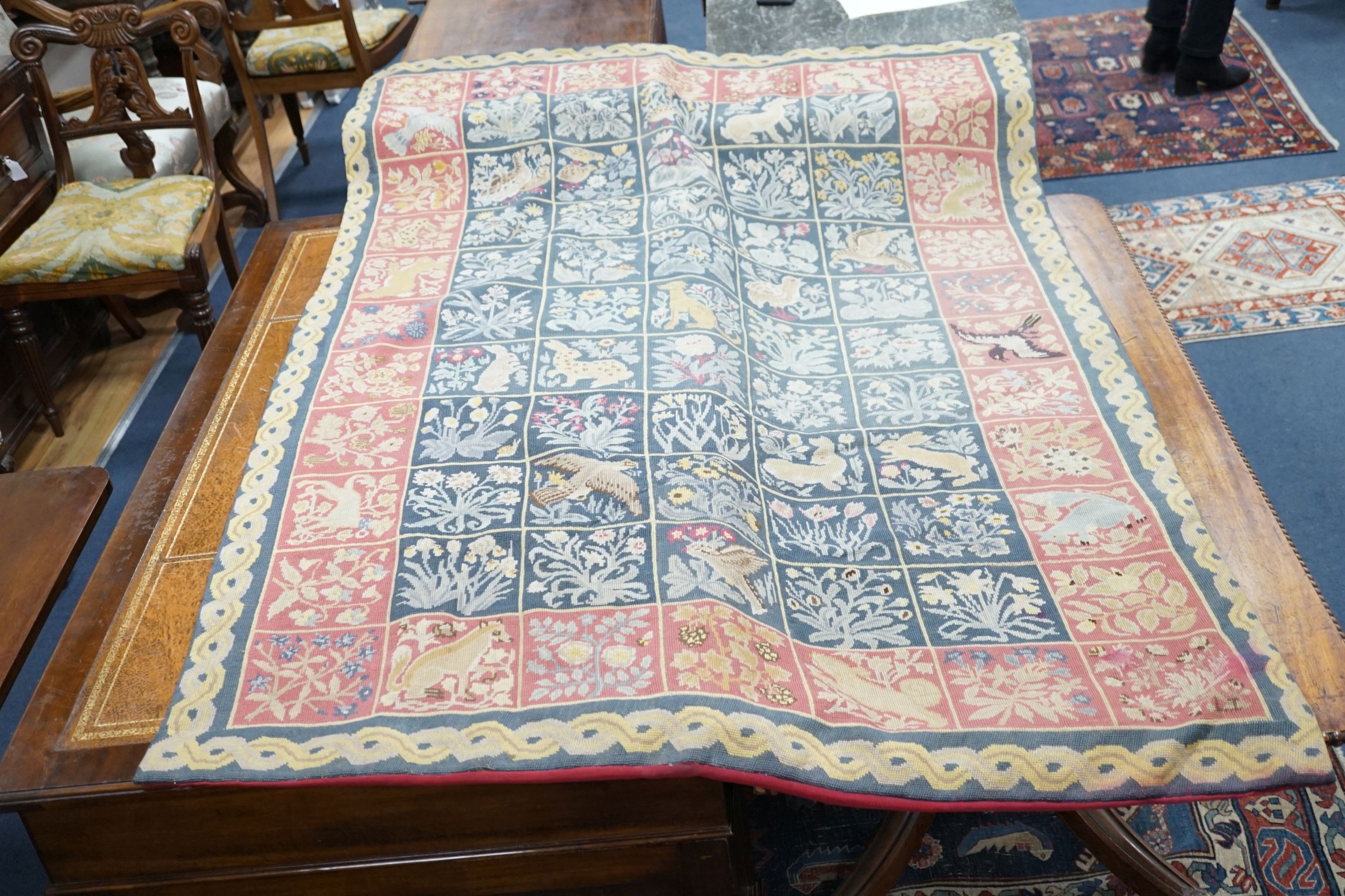 A petit point needleworked rug, 183 x 120cm